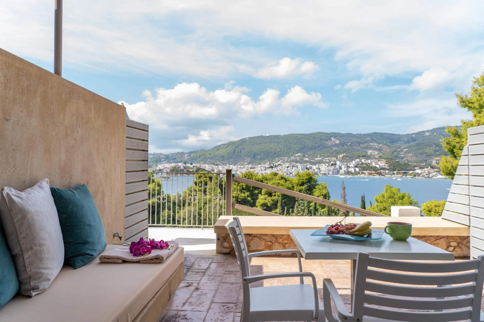 A terrace bench looking across the bay in the Demi Classic Suite at CORE Luxury Suites, Skiathos.